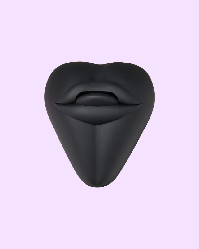 Black | Kissi dildo base cushion cover shaped like a cute mouth with tongue out