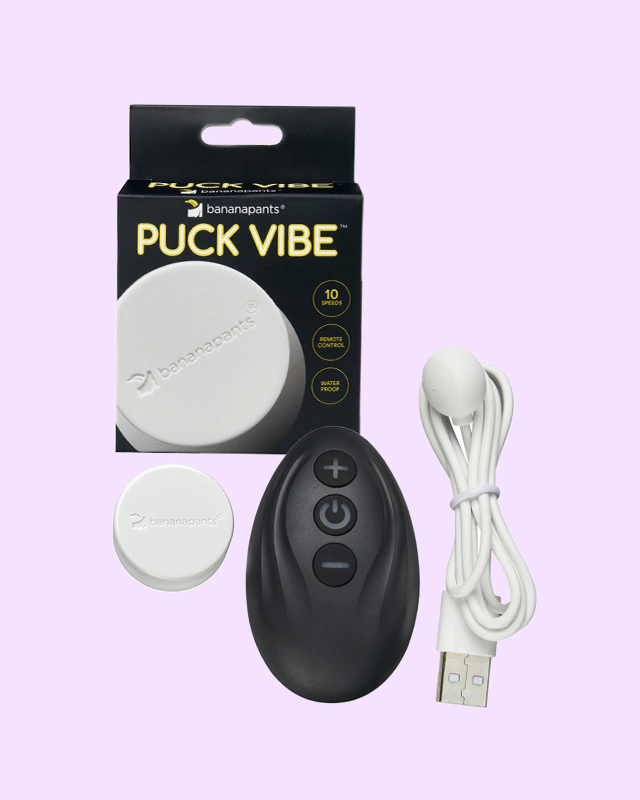 Puck Vibe vibrator and Remote Control with charging cable