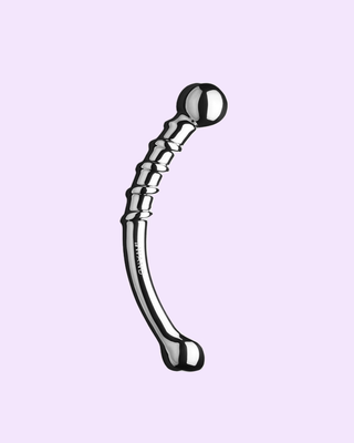 A shiny, curved stainless steel dildo with spiral ridges on one end and a bulbous end on the other.