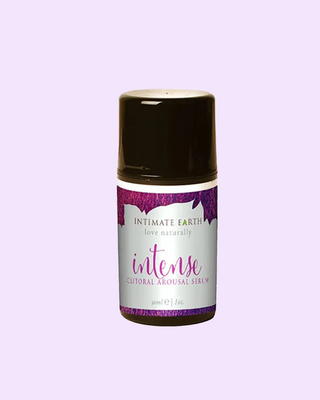 A bottle of Intimate Earth Intense Clitoral Arousal Serum with purple label.