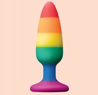 larger sized rainbow-colored anal plug on peach background